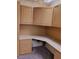Cozy home office featuring built-in desk, wooden cabinets, and ample storage space at 9312 Yucca Blossom Dr, Las Vegas, NV 89134