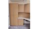 Well-organized home office with built-in cabinets, a spacious desk, and carpeted flooring for a comfortable workspace at 9312 Yucca Blossom Dr, Las Vegas, NV 89134