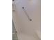 Bathroom shower with grab bar, seat, and frosted glass door at 9312 Yucca Blossom Dr, Las Vegas, NV 89134
