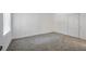 Inviting bedroom featuring neutral carpet and a closet with sliding doors at 9325 W Desert Inn Rd # 120, Las Vegas, NV 89117