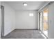Bright bedroom with carpet flooring and sliding glass doors to patio, perfect for relaxation at 9325 W Desert Inn Rd # 120, Las Vegas, NV 89117