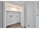 Well-lit laundry room includes hookups and ample space, offering convenience for laundry tasks at 9325 W Desert Inn Rd # 120, Las Vegas, NV 89117