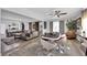 Open-concept living room with modern furnishings and plenty of natural light at 942 Westminster Ave, Las Vegas, NV 89119