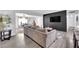 Spacious living room with wood flooring, an open layout, and comfortable seating at 942 Westminster Ave, Las Vegas, NV 89119