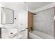 Modern bathroom with a shower-over-tub combination, sleek fixtures, and minimalist design at 9795 La Cienega St, Las Vegas, NV 89183