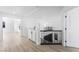 Bright hallway with a staircase, white cabinets and new flooring at 9795 La Cienega St, Las Vegas, NV 89183