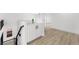 Hallway with new flooring and white cabinets at 9795 La Cienega St, Las Vegas, NV 89183