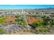 Aerial view of a green space with a basketball court, baseball fields, and mature trees at 9795 La Cienega St, Las Vegas, NV 89183