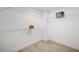 Spacious walk-in closet with wire shelving and light wood-look flooring at 9795 La Cienega St, Las Vegas, NV 89183
