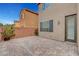 Cozy backyard boasting a brick-paved patio, ideal for relaxation and outdoor entertainment at 10410 Poplar Park Ave, Las Vegas, NV 89166