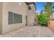The backyard has brick-paved patio that offers a private space for outdoor gatherings and leisure at 10410 Poplar Park Ave, Las Vegas, NV 89166