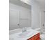 A full bathroom with a large mirror, single sink vanity, and a shower/tub combination at 10410 Poplar Park Ave, Las Vegas, NV 89166