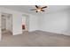 Large bedroom with a ceiling fan and ensuite access at 10410 Poplar Park Ave, Las Vegas, NV 89166