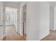 Second floor hallway with a laundry room and bedrooms at 10410 Poplar Park Ave, Las Vegas, NV 89166