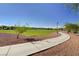 Scenic walking path leads through a large green space in this quiet residential neighborhood at 10410 Poplar Park Ave, Las Vegas, NV 89166