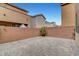 A patio area with brick pavers and a brick perimeter wall at 10410 Poplar Park Ave, Las Vegas, NV 89166