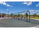 Modern playground provides swings and seating for children and parents in this attractive green space at 10410 Poplar Park Ave, Las Vegas, NV 89166