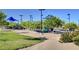 Modern playground equipment, open green space and mature trees make this an attractive neighborhood amenity at 10410 Poplar Park Ave, Las Vegas, NV 89166