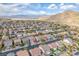 Expansive aerial view of a neighborhood in Las Vegas, Nevada, with mountain views at 10432 Britton Hill Ave, Las Vegas, NV 89129