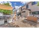 Backyard featuring a pergola covered hot tub, patio area, and a built in barbecue at 10432 Britton Hill Ave, Las Vegas, NV 89129