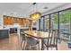 Eat-in kitchen featuring a center island, wooden cabinets, and stainless steel appliances at 10432 Britton Hill Ave, Las Vegas, NV 89129