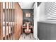 Functional small office space with a wooden partition, desk, and comfortable chair at 10432 Britton Hill Ave, Las Vegas, NV 89129