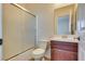 Functional bathroom featuring a shower-tub combination with modern fixtures and updated vanity at 1139 Via Partito, Henderson, NV 89052