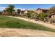 Well-maintained community green space with sidewalks, desert landscaping, and surrounding residences at 1139 Via Partito, Henderson, NV 89052