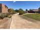 Neighborhood walking path features native landscaping, sidewalks, and residential houses at 1139 Via Partito, Henderson, NV 89052