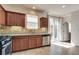 Well-equipped kitchen boasts granite countertops, stainless appliances, and convenient access to a cozy backyard at 1139 Via Partito, Henderson, NV 89052