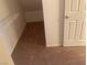 Spacious walk-in closet with carpet and shelving for organized storage solutions at 1139 Via Partito, Henderson, NV 89052