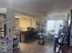 Open-concept living area with kitchen view and lots of natural light at 1281 Challenge Ln, Las Vegas, NV 89110