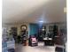 Spacious living room filled with natural light and neutral carpeting at 1281 Challenge Ln, Las Vegas, NV 89110
