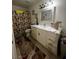 Neutral bathroom featuring a single sink vanity with a white countertop at 1440 Vegas Valley Dr # 2, Las Vegas, NV 89169