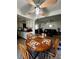 Dining area connected to the kitchen and living room, featuring a round wooden table with four chairs at 1440 Vegas Valley Dr # 2, Las Vegas, NV 89169