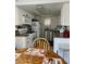 Galley kitchen with white cabinets, modern appliances, and tile flooring at 1440 Vegas Valley Dr # 2, Las Vegas, NV 89169