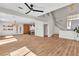 Spacious living room with staircase, open to kitchen and dining at 1551 Boundary Peak Way, Las Vegas, NV 89135