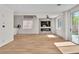 Spacious living room with modern fireplace and access to backyard at 1551 Boundary Peak Way, Las Vegas, NV 89135