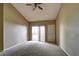 Bright, spacious bedroom with neutral carpet, a private balcony, and an abundance of natural light at 1608 Sussex St # 204, Las Vegas, NV 89144