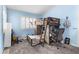 ' bedroom featuring blue walls, a lofted bed with desk, and white shutters at 1777 Antelope Valley Ave, Henderson, NV 89012