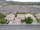 Two-story home with three-car garage, easy access to roads, and a landscaped front yard at 1777 Antelope Valley Ave, Henderson, NV 89012