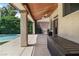 Covered patio area featuring a ceiling fan, creating an ideal spot for outdoor relaxation at 1777 Antelope Valley Ave, Henderson, NV 89012