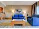 Bright living room features comfortable seating, modern decor, and an inviting wet bar at 211 E Flamingo Rd # 620, Las Vegas, NV 89169