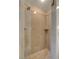 Walk-in shower features modern fixtures and tiled walls at 211 E Flamingo Rd # 620, Las Vegas, NV 89169