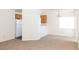 Open living space with view of kitchen including white appliances and breakfast bar at 2191 Bay Club Dr # 204, Laughlin, NV 89029