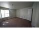 Spacious bedroom filled with sunlight; features a neutral color palette and plush carpeting at 2606 S Durango Dr # 264, Las Vegas, NV 89117