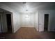 Cozy dining room with carpet flooring and modern chandelier at 2606 S Durango Dr # 264, Las Vegas, NV 89117