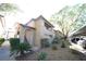 Well-maintained apartment building with mature trees and manicured landscaping offering covered parking at 2606 S Durango Dr # 264, Las Vegas, NV 89117