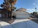 Charming two-story home featuring a spacious two-car garage and well-maintained landscaping at 2821 Willow Wind Ct, Las Vegas, NV 89117