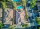 Aerial view showcasing the property with a private backyard pool, mature landscaping and well-maintained homes at 3 Chatmoss Rd, Henderson, NV 89052